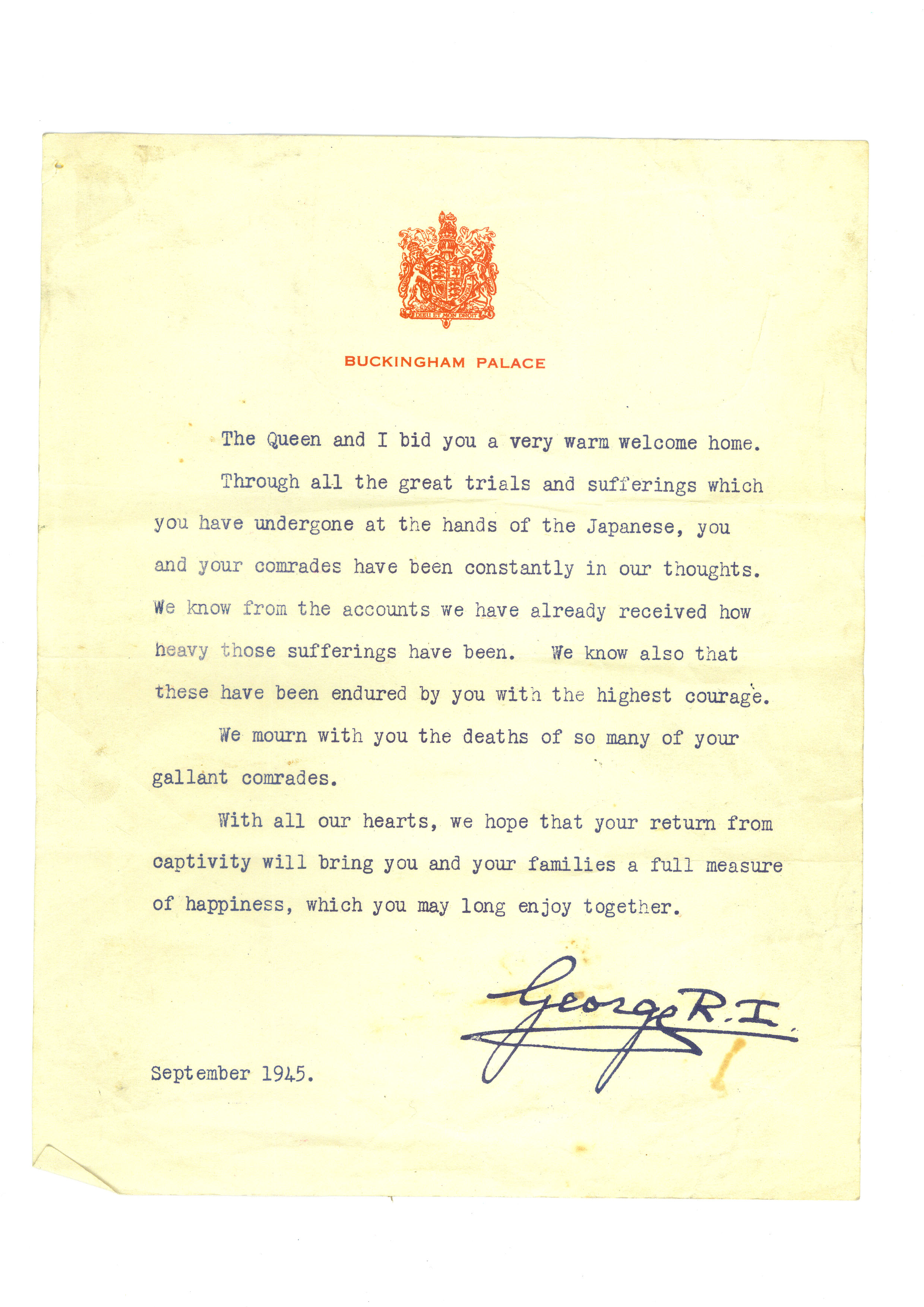 A typed letter on Buckingham Palace notepaper, dated September 1945, welcoming a returning prisoner home, signed George R.I.